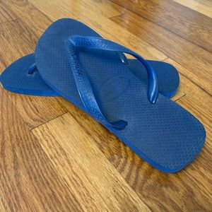 Blue flip flops Havaiana’s for men.  NWOT